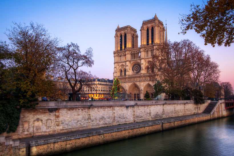 Travel Associates notre dame Paris at dusk