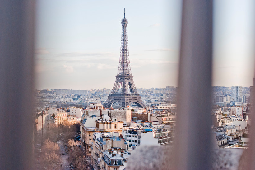 Travel Associates view of Eiffel Tower through window