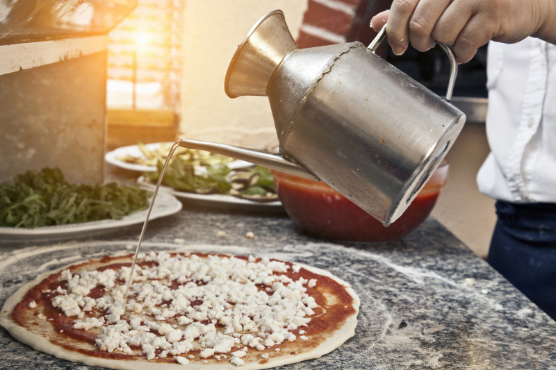 Man makes pizza