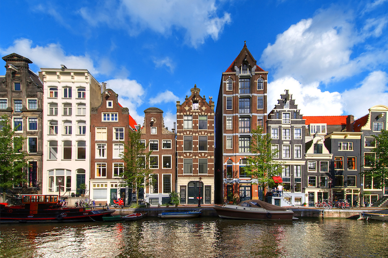 Picturesque narrow houses along the canals of Amsterdam.