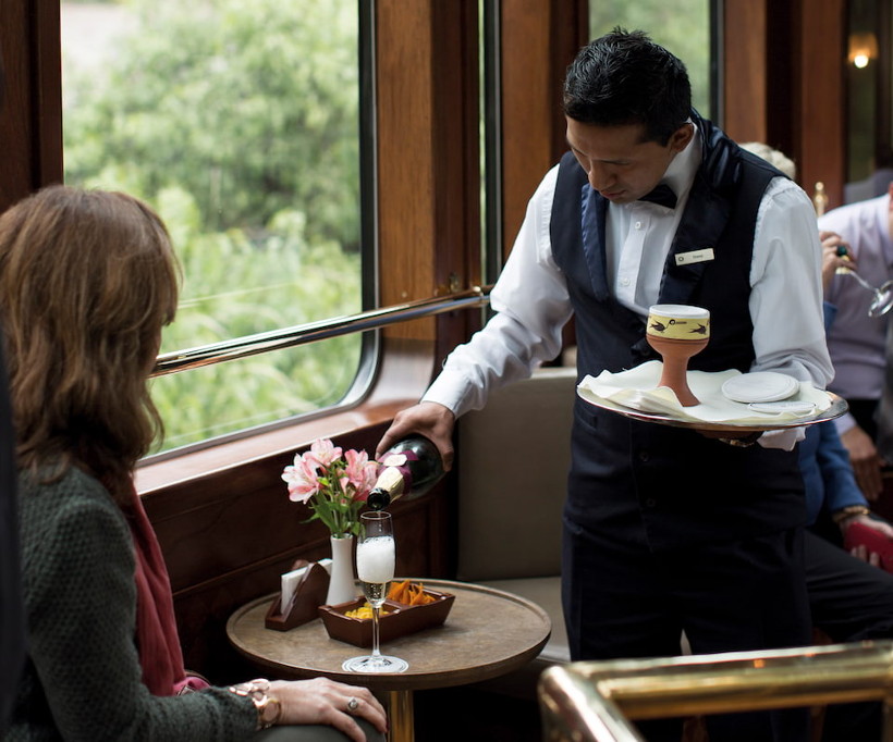 Belmond Hiram Bingham train waiter