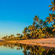 Two people standing on the beach, Fiji