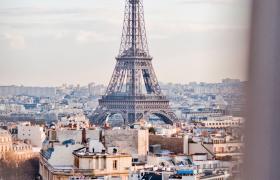 Travel Associates view of eiffel tower through window